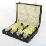 An Edwardian silver mounted yellow glazed porcelain coffee set