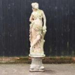 A reconstituted stone garden statue