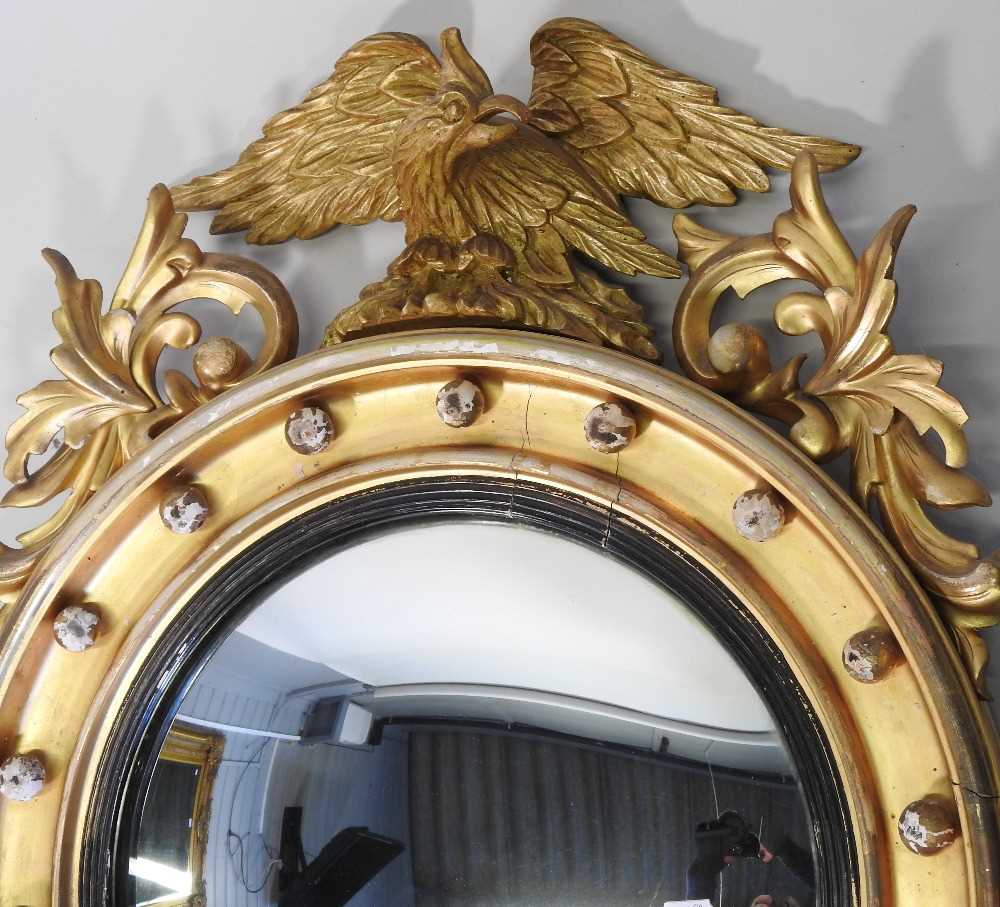 A Regency carved pine and gilt gesso framed convex wall mirror - Image 6 of 18