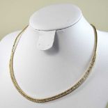 A 14 carat gold diamond necklace