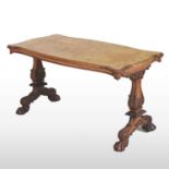 A good Regency carved walnut and burr walnut sofa table