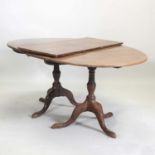 A 19th century mahogany twin pedestal dining table