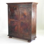 An 18th century continental oak side cabinet