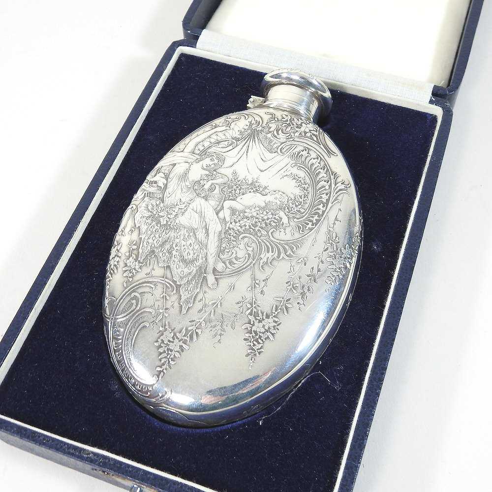 An early 20th century Tiffany engraved silver hip flask