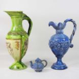 A 19th century Castle Hedingham pottery green glazed ewer