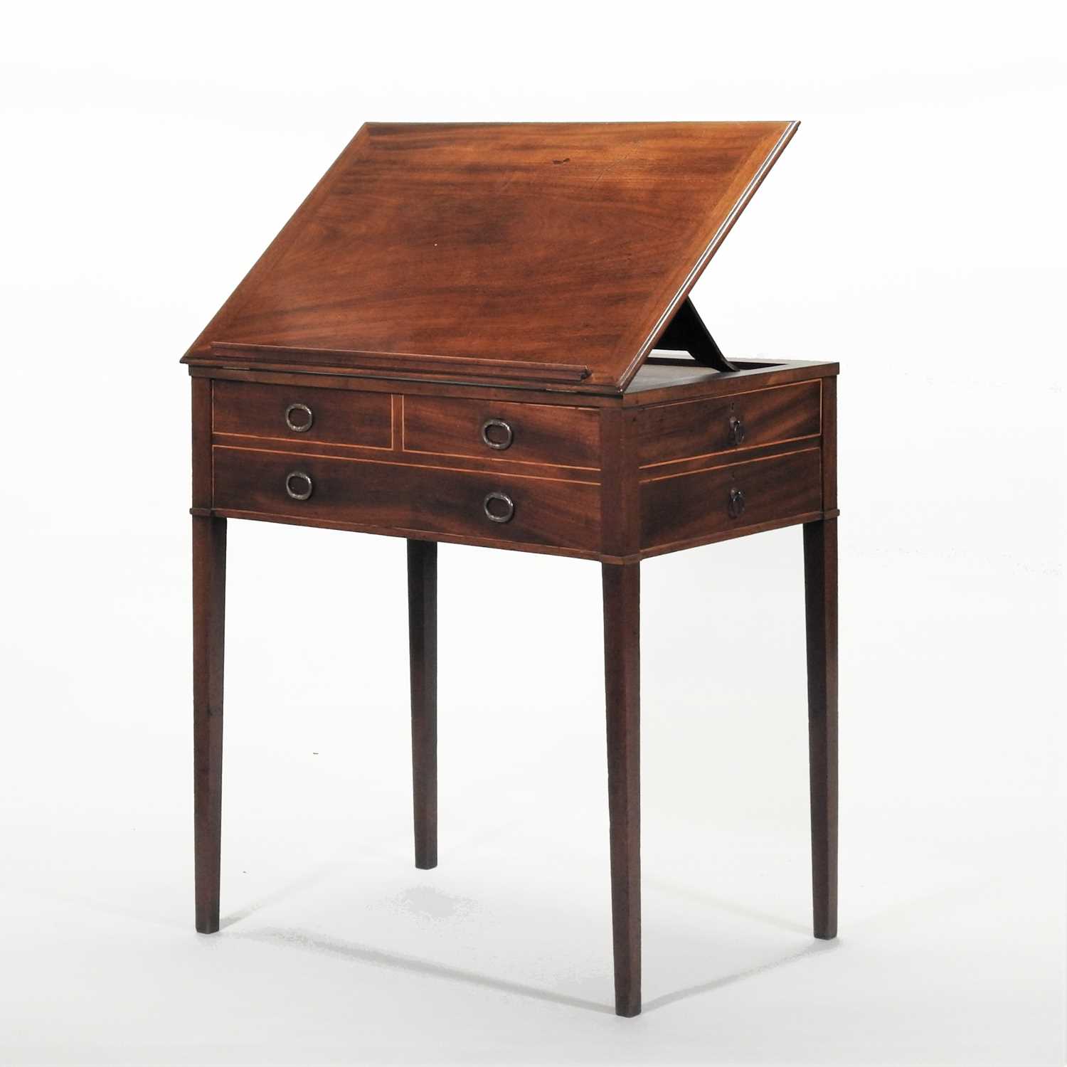 A Regency mahogany and boxwood strung reading table