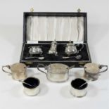 An early 20th century silver three piece condiment set