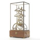 A hand made brass skeleton clock movement