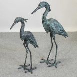 A verdigris style metal garden model of a heron