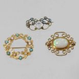 A 15 carat gold moonstone brooch,