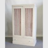 A Victorian later white painted wardrobe