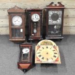 A collection of four various wall clocks