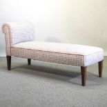 A drop end check upholstered day bed