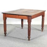 An antique pine dining table