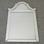 A Venetian style wall mirror