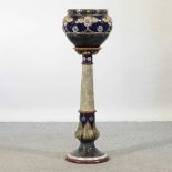 A 19th century Royal Doulton stoneware jardinière on stand