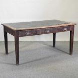 An early 20th century military oak writing desk