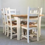 A light oak and white painted dining table