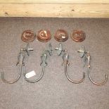 A set of four Arts and Crafts brass gas wall lights