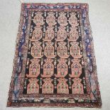 An antique Persian rug