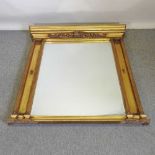 A gilt over mantel mirror