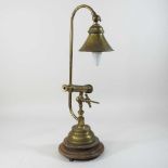 A 20th century brass reading lamp
