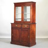 A 19th century stained pine cabinet bookcase