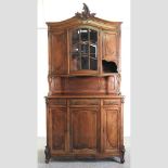 A late 19th century French fruitwood cabinet