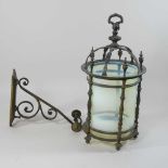 An Arts and Crafts brass hanging lantern