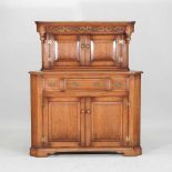 A 20th century oak standing corner cabinet