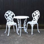 A white painted metal garden table