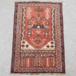 A Persian prayer rug