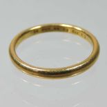 A 22 carat gold wedding band