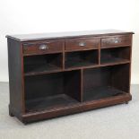 A modern hardwood dwarf open bookcase