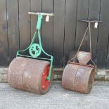 A green painted garden roller