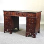 A reproduction pedestal desk