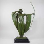 An Art Deco painted bronze sculpture of an archer