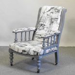 An Edwardian and later grey painted upholstered armchair