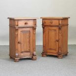 A pair of pine bedside cabinets