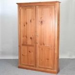 A mid 20th century pine cabinet