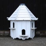 A white painted wooden dovecote