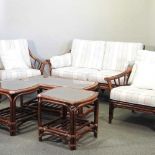 A bamboo four piece conservatory suite