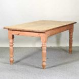 An antique pine dining table