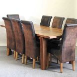 A modern light oak extending dining table