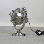 A chromed table lamp