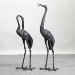 A modern verdigris garden model of a crane,