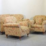 A modern floral upholstered two seater sofa