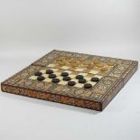 An early 20th century Indian Sadelli games box