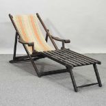 A folding wooden deck chair