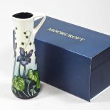 A modern Moorcroft pottery 'Dog Violet' pattern ewer